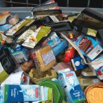 Depackaging equipment for recovering organics is designed to deal with a variety of materials from plastic wrapping and containers, to wax-coated cardboard and even metal cans and glass bottles.