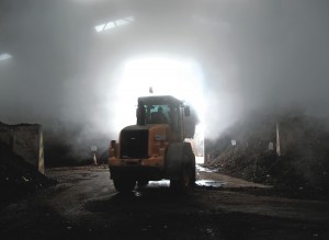 Negatively aerated compost maturing shed with biofilter