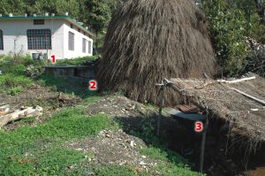 Palar household daisy-chains two Deenbandhu biogas digesters