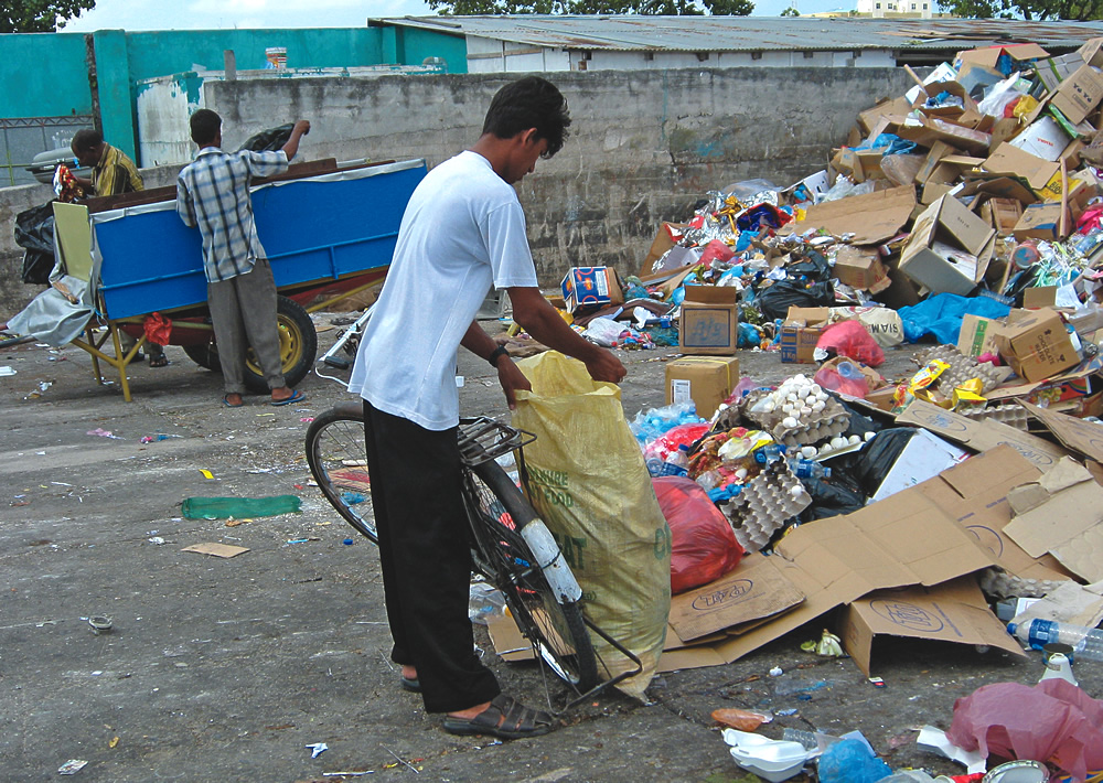 Informal waste collectors pick up mostly from residences, and bring materials to a transfer station (above).