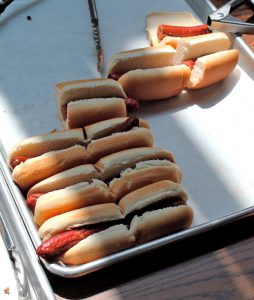 Kitchen staff at the Far Hills Country Day school cut hot dogs and hamburgers in half before serving to help reduce wasted food. 