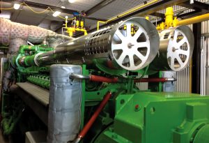 The GE Jenbacher J624 gas engine (above) for greenhouse CHP has a two-stage turbocharger to enable a high level of heat recovery. The cogeneration technology combines the engine, catalytic converter and heat exchanger. 