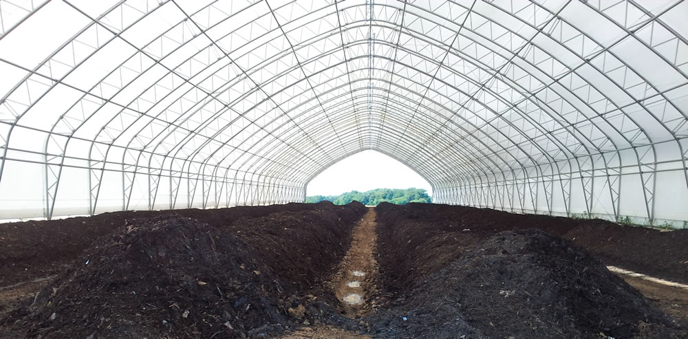 To better control the composting process, a ClearSpan fabric building was installed. The building accommodates four 450-foot long windrows.
