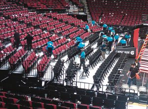 At the Portland Trail Blazers’ arena, post game crew collects recyclables. The Blazers were one of the first sports teams to collaborate with the NRDC on venue greening.