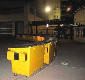 Food waste and compostables are collected in smaller carts and then emptied into 2 cubic yard containers that are set out in a cul de sac near the right field gate.