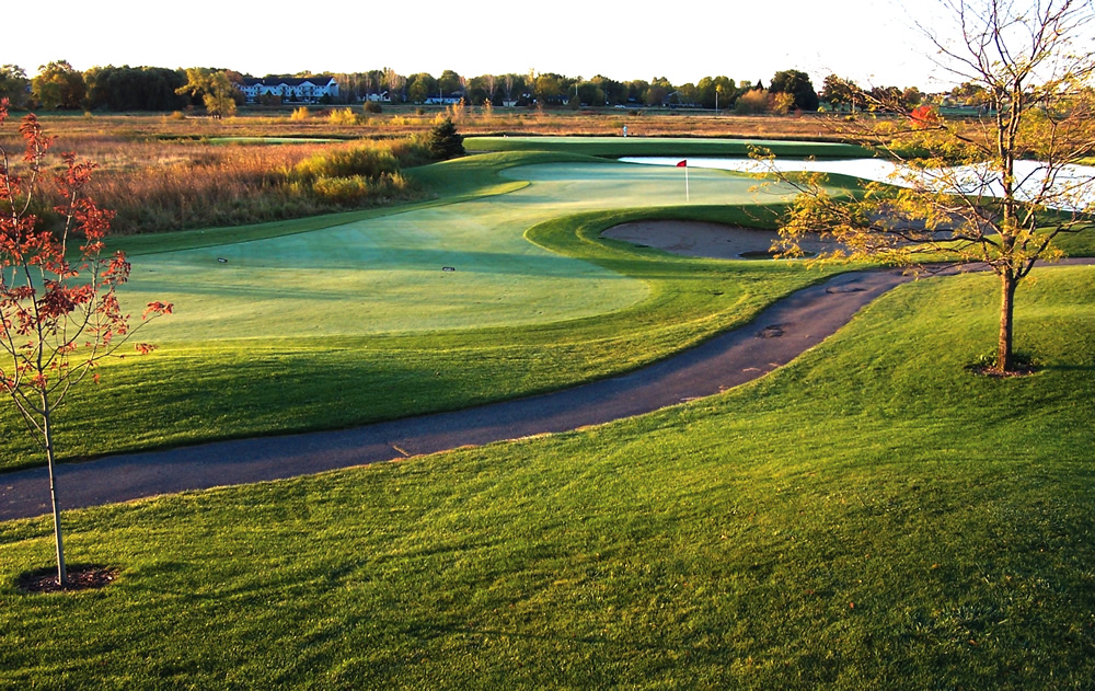 Within three years of when compost was first used on the fairways and tee boxes, the Meadows of Sixmile Creek golf course in Wanaukee, Wisconsin was able to replace 100 percent of its synthetic fertilization and 95 percent of its chemical herbicides. Compost is supplied by Purple Cow Organics.
