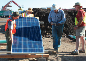 The photovoltaic power system is comprised of panels, an inverter, a battery bank and a system of switches and timers all enclosed within a durable metal cabinet.