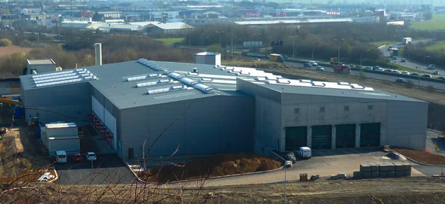 Preprocessing, anaerobic digestion and composting operations are enclosed at the Syndicat Minett-Kompost facility. 