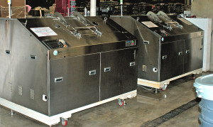 BioHitech America utilizes microbes and enzymes to break down food waste in its biodigesters (two units shown side-by-side at a food bank installation in New Jersey).