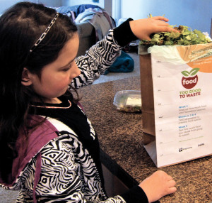 The U.S. EPA Food: Too Good To Waste pilot projects have households — such as this family participating in the King County, Washington pilot — measure how much food goes to waste.