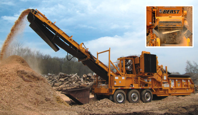 The Bandit Beast 2680 grinder has a 35-inch opening, which works well with wood chunks (right). To make its final mulch products, aged wood chips are run through a 1-inch diamond screen on the grinder.
