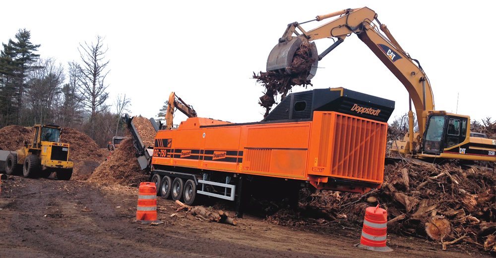 Aggregate Recycling Corporation uses the Doppstadt Kombi with a combined shredder and high speed grinder to process stumps, logs and brush.