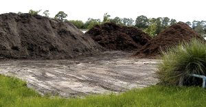 Harvested algae is mixed with yard trimmings and/or mulch and formed into piles. A Brown Bear aerator is used to turn the piles for the first five days of composting.