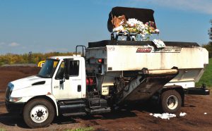 AgRecycle uses a Roto-Mix to size reduce the food waste, compostable products and corrugated, as well as blend those materials prior to composting.