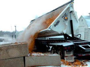 The SmithCo Side Dump trailers have a fully welded tub with no gates, making the unit water-tight. Its side-dumping feature enables the truck to build a composting windrow as it unloads.