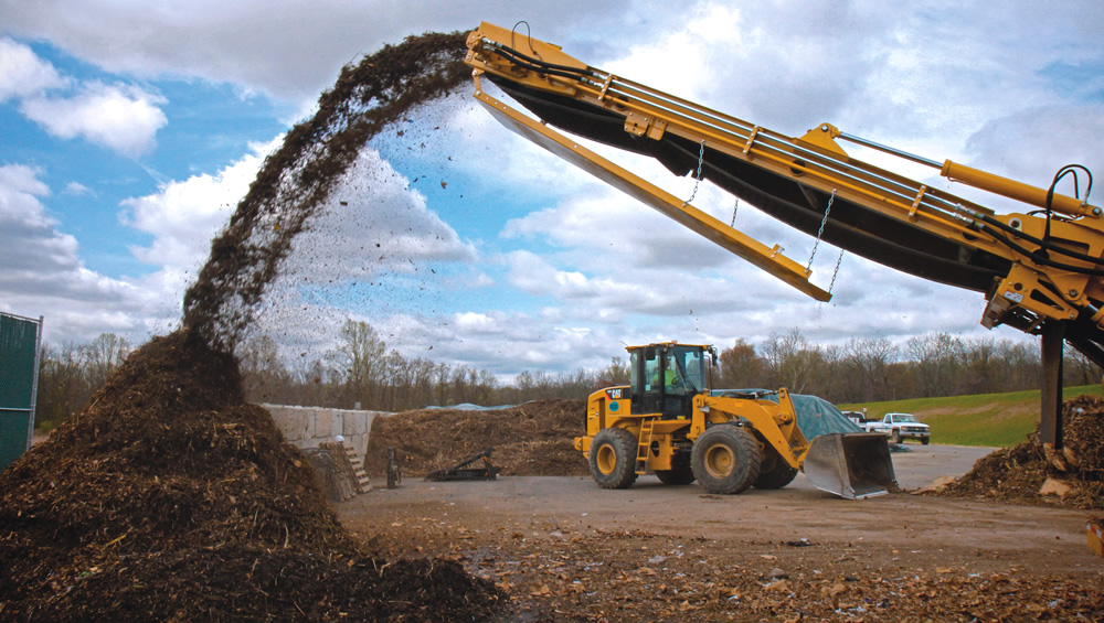 Howard County is running a residential source separated organics collection pilot, and composting materials at its Alpha Ridge Landfill site (feedstock materials grinding shown here).