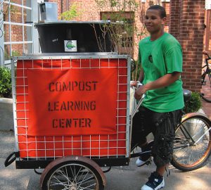 Earth Matter NY collects food scraps from the public sorting stations and vendors on Governors Island using a tricycle modified for that purpose. 
