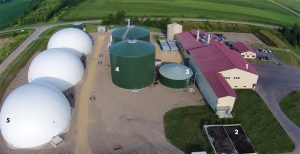 The footprint of the Hometown Bioenergy anaerobic digestion facility is shown at left: (1) Receiving building; (2) Biofilter; (3) Liquid storage tank; (4) CSTR reactors; (5) Biogas storage units.