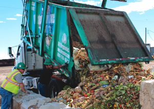 Commercial organics are unloaded prior to a demonstration of depackaging equipment at A1 Organics.