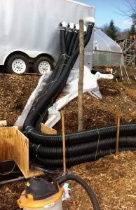 A “plug and play” Compost Heat Wagon, operating this winter at Vermont Compost Company, includes a high power aeration fan and an Isobar™ heat recovery system.