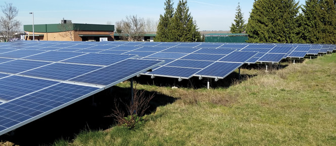 A 420 kW peak capacity ground-mounted solar energy system was installed in late 2009 at no capital cost to the City of Gresham.