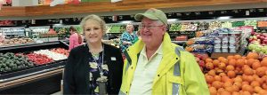 Janet Landon, manager of the Lewis Main Commissary (left), pictured here with James Lee, manager of JBLM’s Qualified Recycling Program, has become a national beacon of waste reduction techniques for military base commissaries.