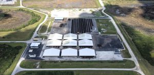 Ten acres of the composting site were upgraded for use as curing pads (top of photo). The three new structures (foreground) are on a 2.75-acre pad.