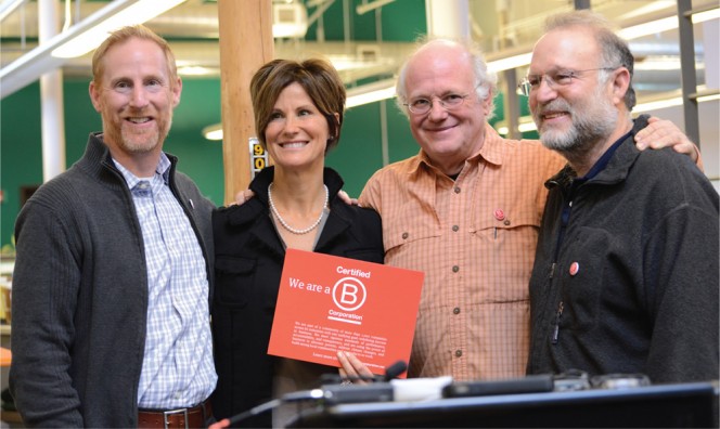 GMP is the first utility in the world to receive B Corp certification, having met rigorous standards of social and environmental performance, accountability and transparency. Joining Mary Powell at the celebration last December are (from left to right): Jay Coen Gilbert, cofounder of B Lab, and Ben Cohen and Jerry Greenfield, founders of Ben & Jerry’s, also a B Corp.