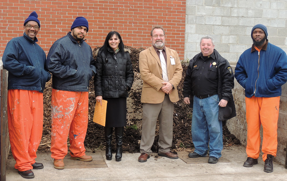 People involved in PPS composting (left to right): Dexter Adams, Kuldip Singh, Laura Cassidy, Lt. Edward Bender, Officer Rick Orange, and Reginald McCorey