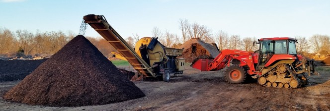The Compost Company occupies a 37-acre site in rural Cheatham County. Composted mulch is shown being screened.