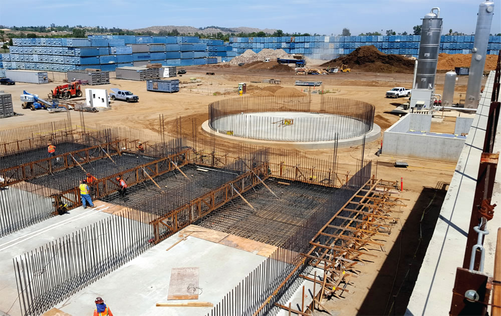 During construction, the foundation was also poured for the Phase 2 build out, which will include another four digesters (Phase 1 digesters during construction in foreground above).