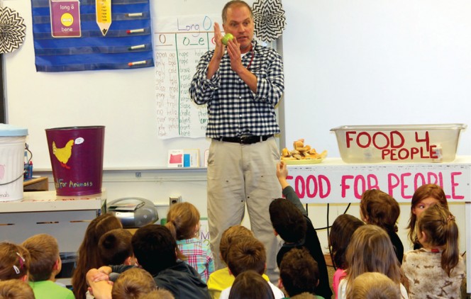 Clark explains the food waste separation project to students in his Living Environment class at Parish-Hopkinton Central School in Parishville, New York.