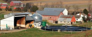 The complete mix anaerobic digester on Reinford-Frymoyer Farm manages about 210,000 gallons/month of manure, about 20,000 gallons/month of grease trap waste and about 110 tons/month of food waste.