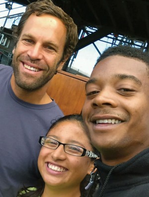 Jack Johnson, on left, with urban farmer Darius Jones on right. 