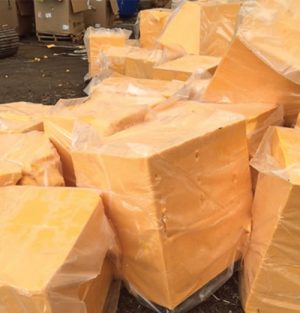 The Onondaga County Resource Recovery Agency (OCCRA) composting facility receives food waste from many large entities, including a university, grocery store chain, shopping mall and food and candy manufacturers (blocks of cheese seen here)