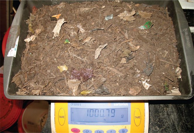 One kilogram of contaminated dry compost. 
