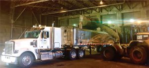 Food scraps collected from ecomaine member communities are unloaded on a tipping floor at the waste authority’s waste-to-energy (WTE) plant, and then reloaded into a long-haul truck operated by Agri-Cycle Energy, which brings the material to the digester.