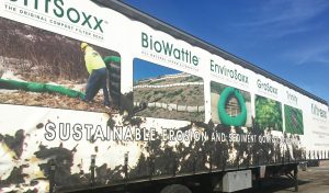 Signage on semi trailer that transports palletized Soxx promotes some of Filtrexx’s signature products and illustrates growth of the product line and its applications.