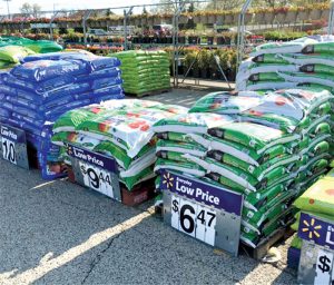 A display of Magic Dirt horticultural products at a Walmart garden center. 