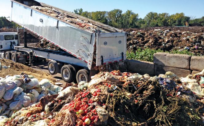 An organics load from Hennepin County is tipped at the Specialized Environmental Technologies, Inc. (SET) composting facility in Empire Township.