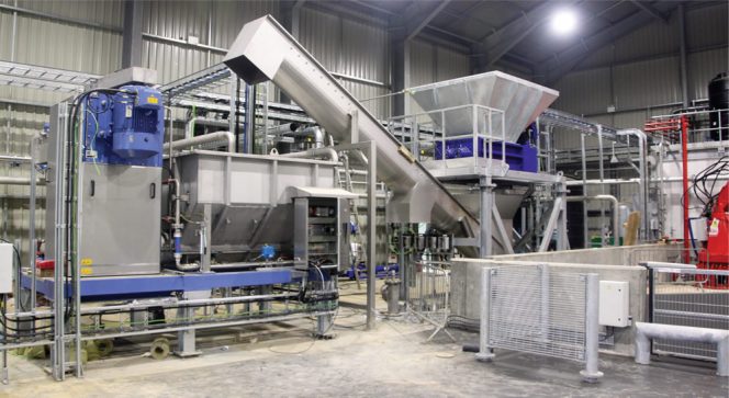 Solid food waste feedstocks will be depackaged, decontaminated and slurried to 10 to 14 percent solids in the Re:Sep system (example installation above). The unit includes a vertical paddle mill with 2 sizes of screen mesh.
