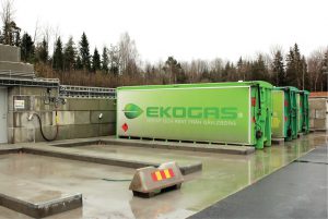 A biogas absorption upgrade system produces biomethane at about 99 percent methane, which is pressurized and stored for delivery via a road tanker (fuel tanker station shown).