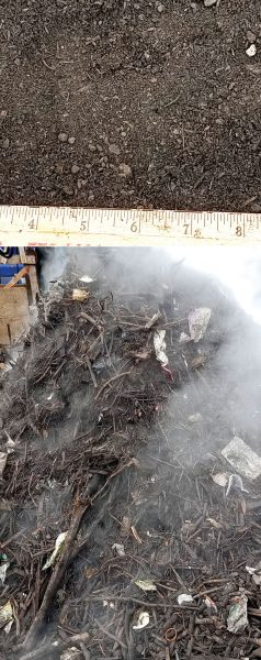 Screening and separation results: The D.H. Control product (fines top overs bottom) after the trommel and air separator. Most of the plastic is over 12 inches in at least one dimension (width and/or length).