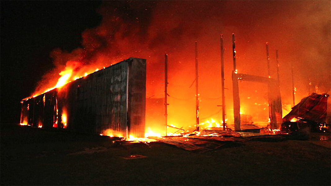 Large mulch fire burning for days likely caused by spontaneous